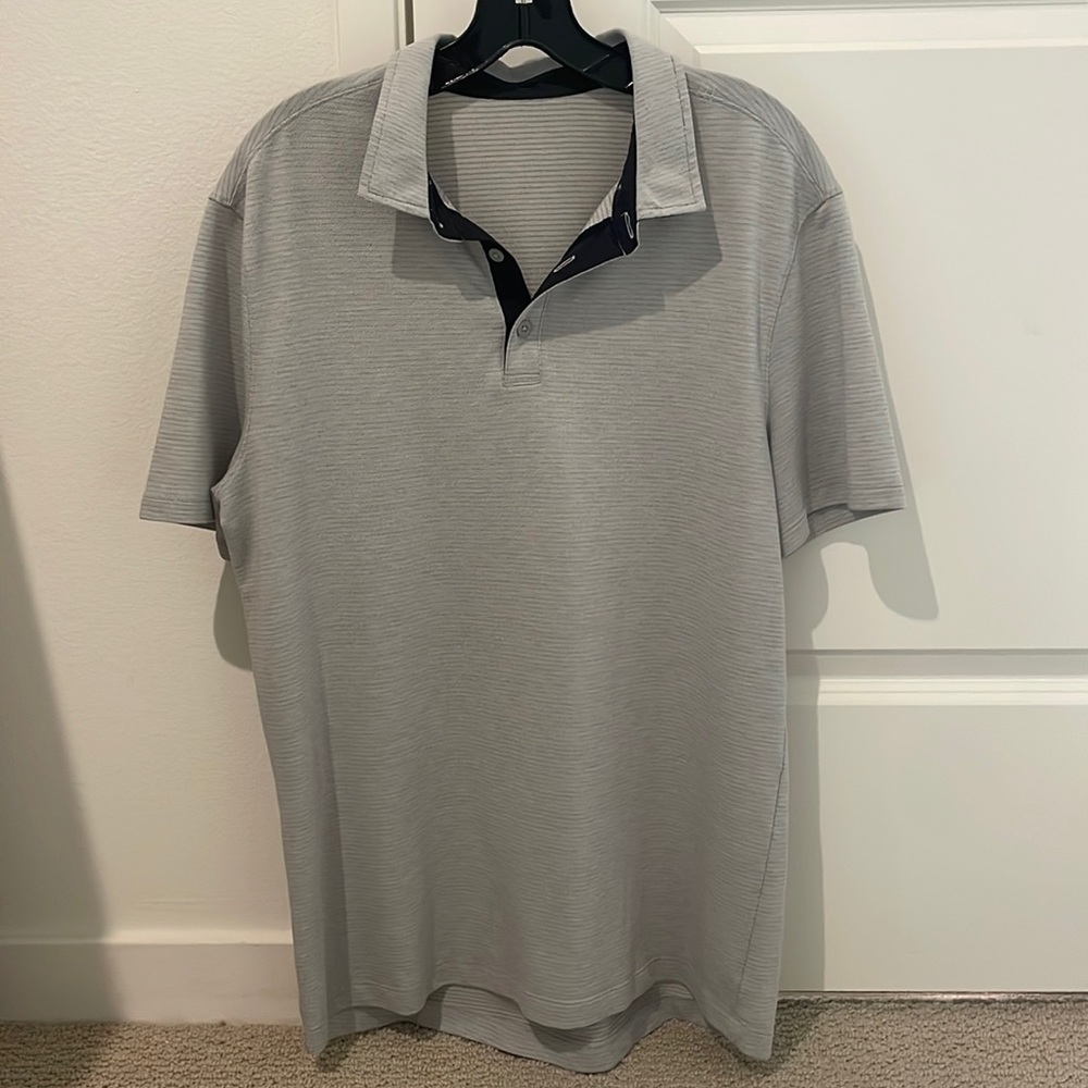 Sticky smelly shrunken- Lululemon Evolution Polo